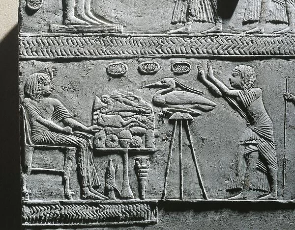 Horemheb eating funerary meal, relief from the tomb of Horemheb at Saqqara