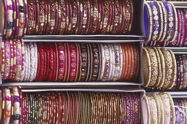 India, Delhi, colourful display of lac bangles, close up