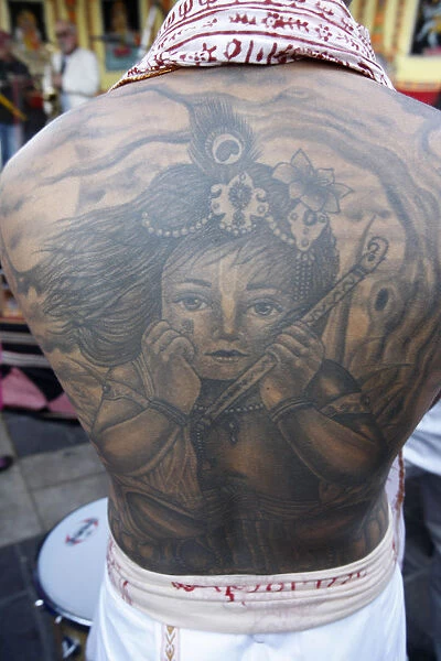 Krishna tatoo on devotees back