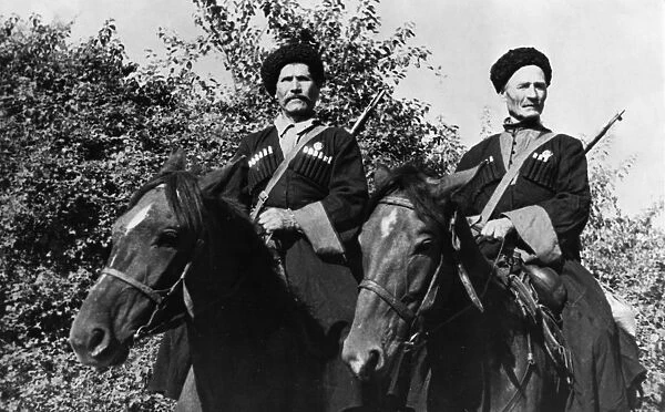 Kuban cossacks, 60 year old pavel kamnev (left) and 63 year old mikhail grachev, who volunteered for service in a cossacks corps, in one attack, they sabered 28 german officers and men between them, northern caucasus, 1942
