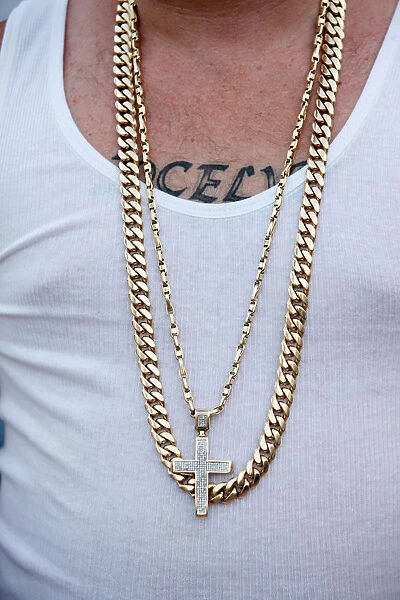 Man with gold chains