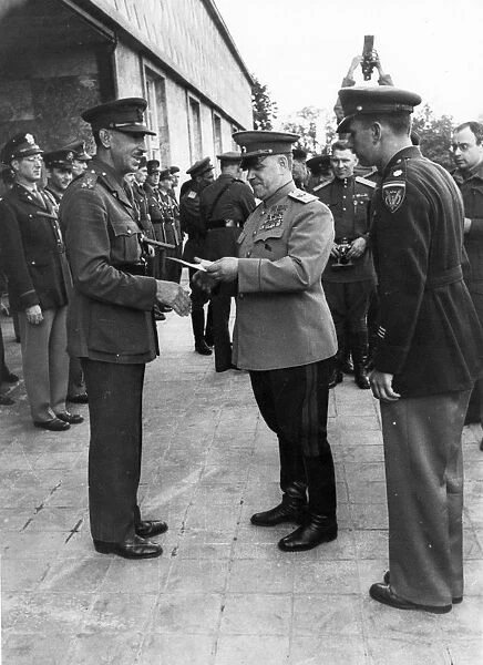 Marshal georgy zhukov meets general eisenhower and field-marshal montgomery and hands out orders and medals to officers of the american army, 1945, world war 2