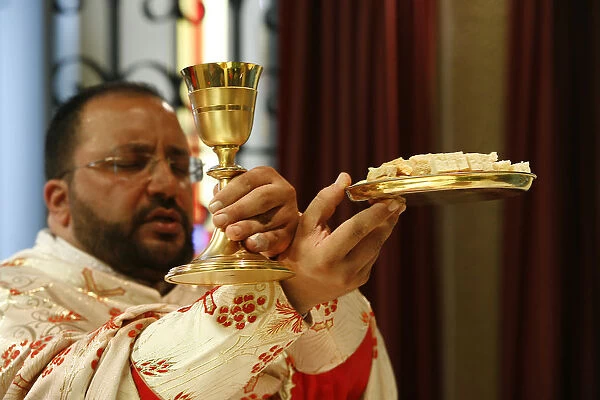 Melkite priest celebrating mass