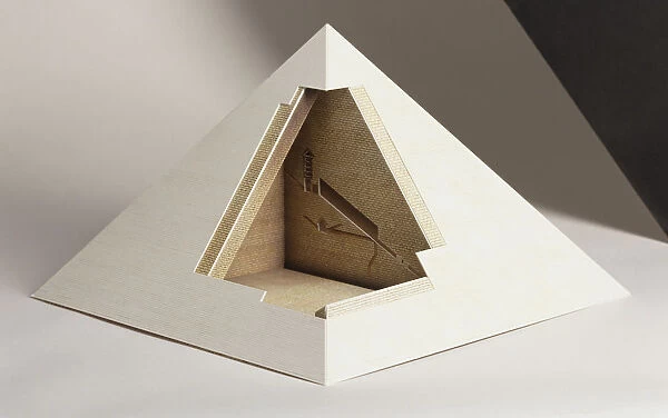 Model of pyramid with corner section removed to reveal inner structure, front view