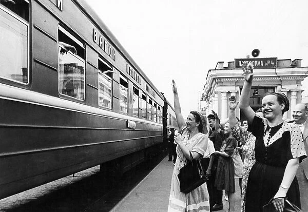 A moscow-tbilisi train pulling out of the kursk railway station in moscow, july 1950