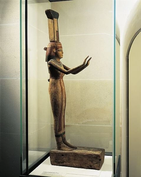 Painted wood statue of goddess Nephthys mourning for Osiris