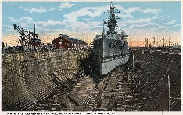 Postcard of a US Battleship in a Navy Dry Dock. ca. 1913, A US battleship in drydock at the Norfolk Navy Yard
