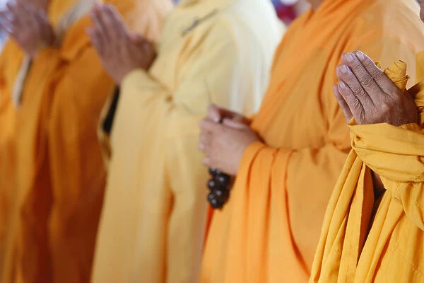 Praying Buddhist monks
