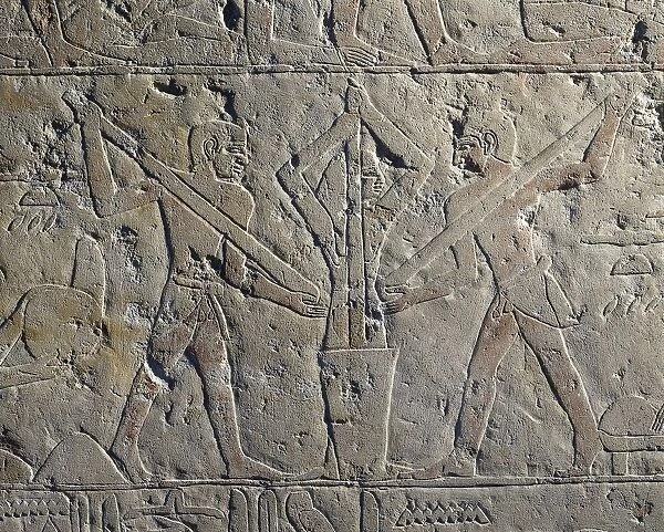 Reliefs from the mastaba of Kemrehu. Detail: wheat grinding with pestle