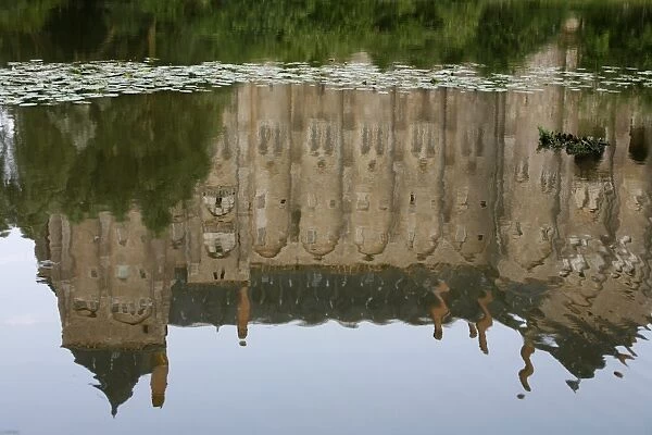 Saint-Pierre of Solesmes abbey reflected in the Sarthe river
