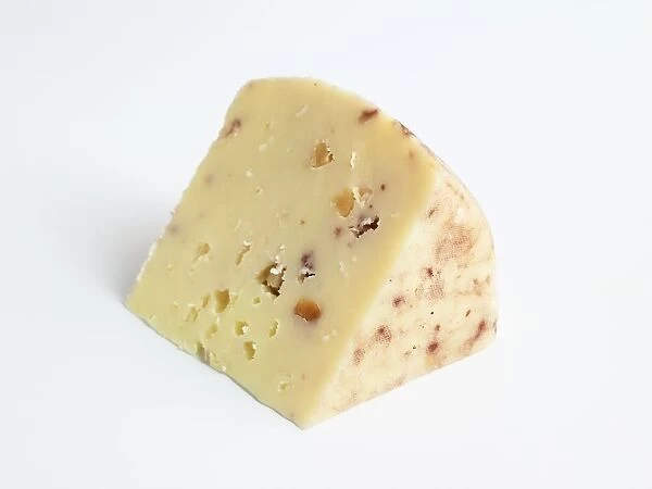 Slice of Spanish Taramundi cow and goats milk cheese
