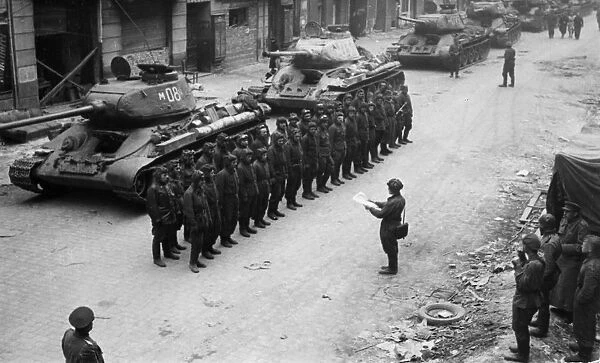 A soviet armored division receiving operational orders prior to the final battle in berlin, germany, march 1945