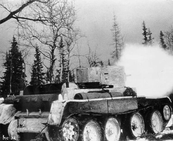 Soviet-finnish war, 1939-1940, a soviet red army tank firing, a still from the newsreel documentary film, mannerheim line
