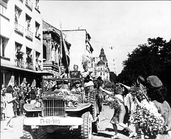 Soviet red army troops being greeted by citizens of sofia, bulgaria after being liberated from the germans in 1944
