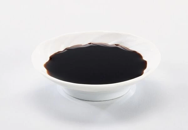 Soy sauce in a white China bowl