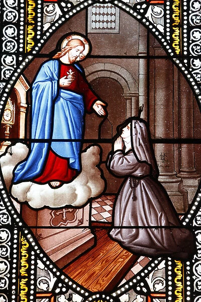 Stained glass depicting Sainte Marguerite-Marie Alacoque