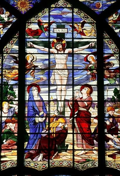 Stained glass window. Jesus on the cross. Saint-Jean de Montmartre church
