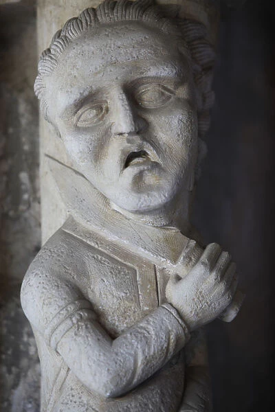 Detail of a statue in Saint Georges abbey chapter house (12th century)