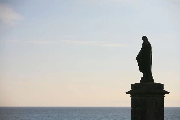 Statue of the Virgin Mary facing the Atlantic ocean