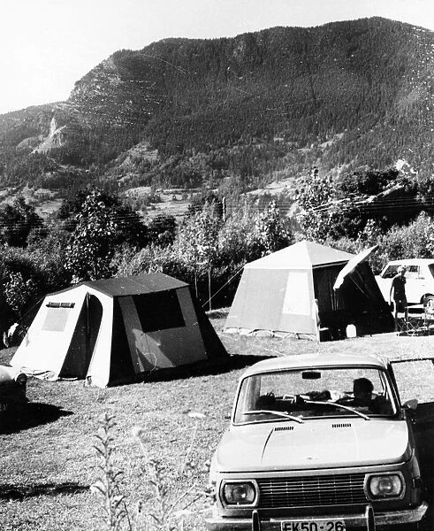 Tourists camping by smolian lake in the rhodope mountains, bulgaria, may 1974