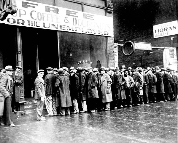 Unemployed men queuing outside a soup kitchen in New York, c1930, during the Great Depression