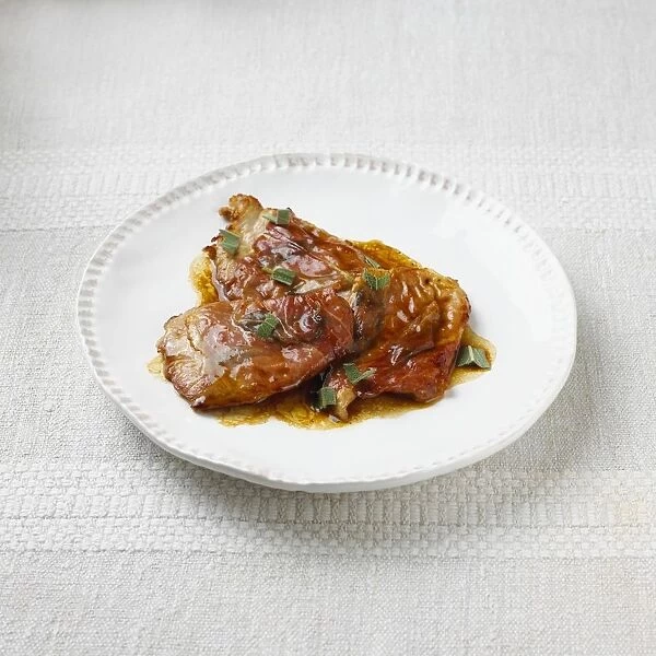Veal escalopes with sauce and herbs