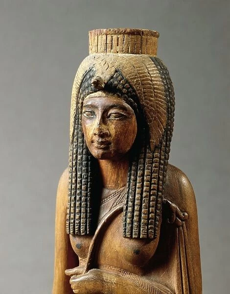Wooden statue of Ahmes Nefertari, wife of Amenhotep I, from Deir el-Medina, detail, the bust, New Kingdom, Dynasty XIX