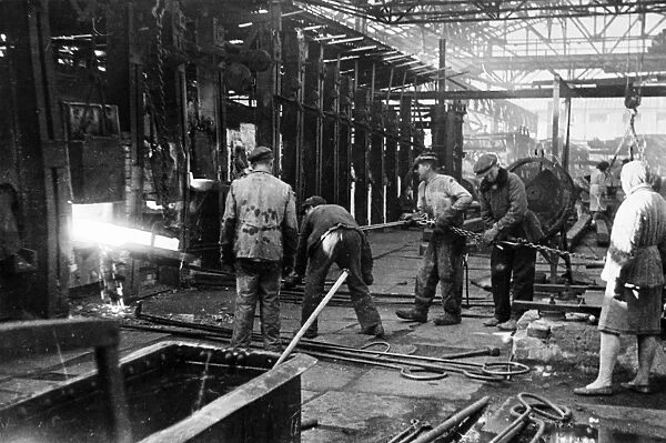 Workers of the krasny oktyabr iron and steel works back at work at the restored plant in stalingrad, ussr, 1940s
