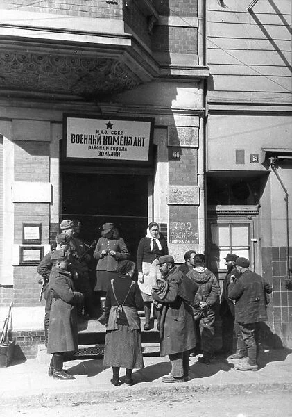 World war 2, at the entrance to the building occupied by the soviet military commandant of thecity and district of soldin, germany, 1945