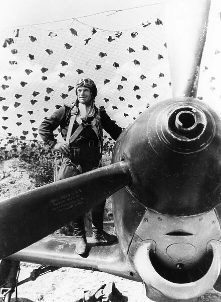 World war 2, soviet air force pilot, kankeshev ahmet haptal from the north caucasus, about to climb into a yakovlev yak-9 fighter, he shot down 6 german planes in 9 days near kuban