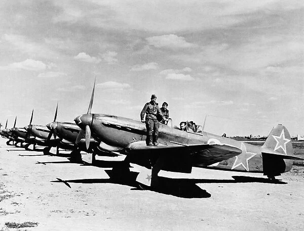 World war 2, soviet air force yakovlev yak-9d fighters lined up on an airfield, the squadron guards the new u, s, bases for aircraft landing in the soviet union