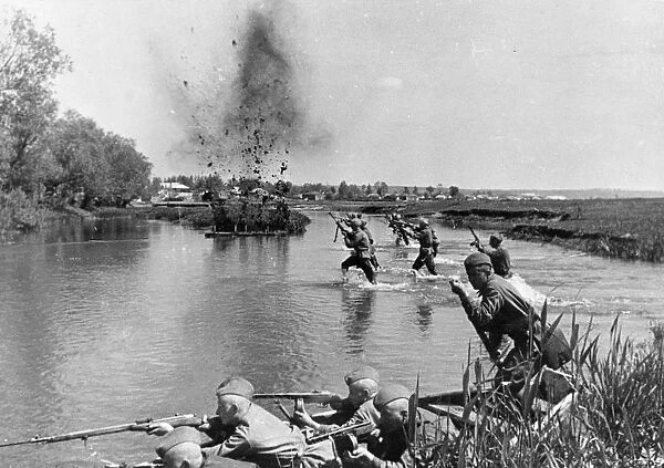 World war 2, soviet infantry crosing a river in ukraine under fire, 1943