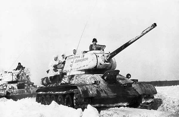 World war 2, soviet t-34 tanks in snow, front tank is named dimitry donskoy