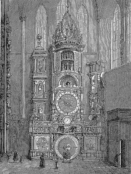 The clock in Strasbourg Cathedral, astronomical clock, with the angel's pillar to the left, Strasbourg, France, c. 1870, digitally restored reproduction of a 19th century original, exact original date not known