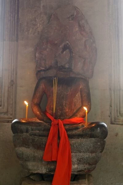Old Hindu statue at Angkor Wat temple in Cambodia