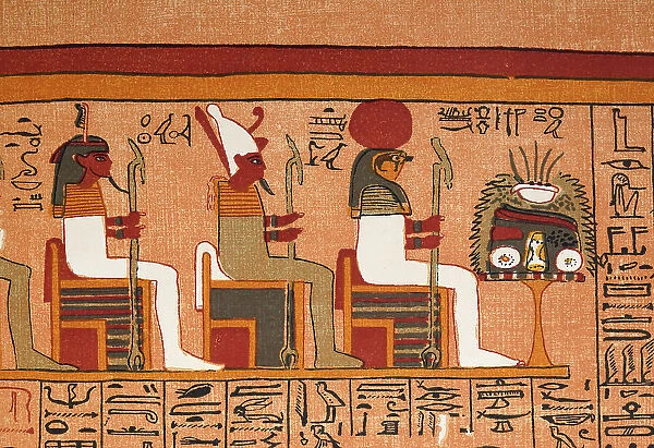 Seated Ancient Egpytian Gods, including the hawk head Horus god of kingship and the sky