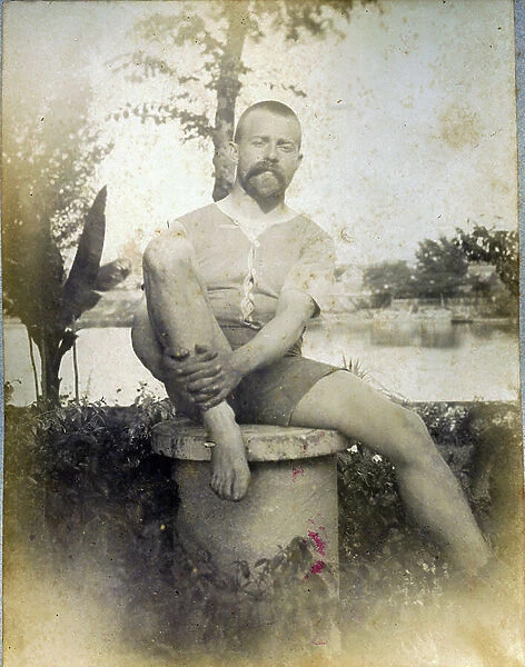 Africa, Dakar: a soldier poses seated, 1885