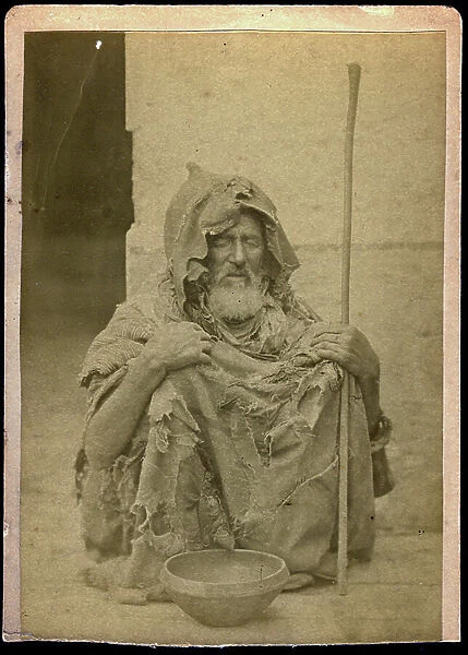 Algiers: a beggar with his eclect, 1860