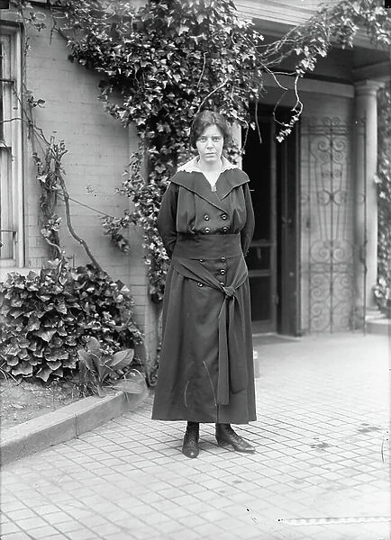 Alice Paul, American Suffragist, Feminist, and Women's Rights Activist, Standing Portrait, c. 1918 (b / w photo)