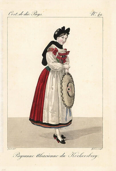Alsatian peasant woman in festival costume, Kochersberg, 19th century. Her bonnet and bodice are embroidered with silver thread. The black tie is traditional to the town. The red petticoat was worn on festival days