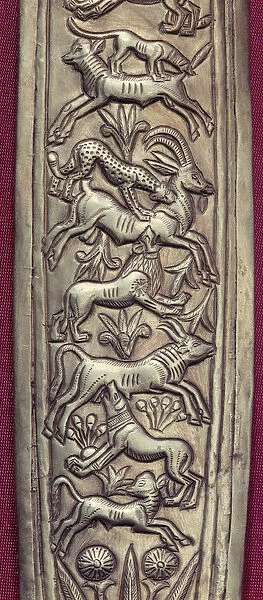 Antelope, deer and a calf being attacked by a leopard, a lion and a dog
