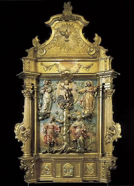 Baroque art: altarpiece of the genealogy of Christ. The Jesus child at the top of the tree of his ascendants Mary and Joseph. Polychrome wood by Pedro de Sierra (1702-1760) 18th century