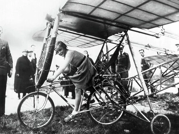 Beginning of the aviation : little girl on a flying bike, end of the 19th century