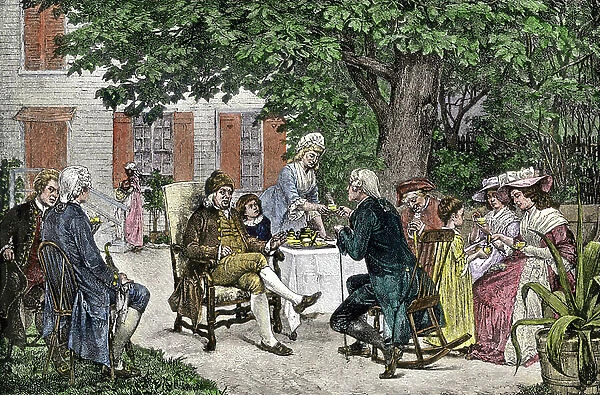 Benjamin Franklin (1706-1790), Alexander Hamilton (1755-1804) and others discussing the conception of the United States constitution has a tea party in a garden in Philadelphia, 1787. Colour engraving of the 19th century