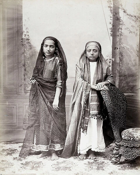 Two Borah children in traditional dress, in a photographic studio in Bombay, 1890 (print on double-weight paper)