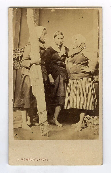 Boulogne-sur-Mer, Pas de Calais (62), Nord-Pas-de-Calais, France, Studio portrait of three Boulonnaises with fish basket and net in traditional clothing, 1865