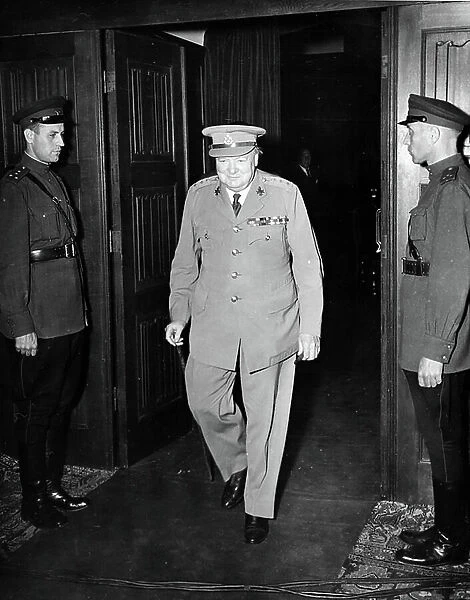 British Prime Minister Winston Churchill exiting the conference room in Cecilienhof