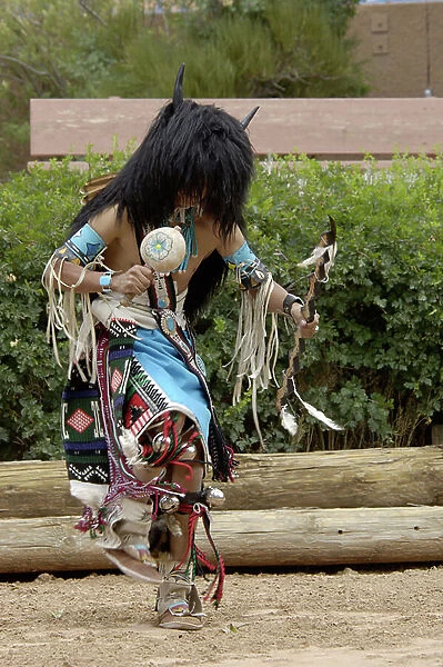 Buffalo Dance performed by a Zuni Pueblo Red-tailed Hawk Dancer at the Gallup Intertribal Ceremonials, New Mexico.Digital photograph
