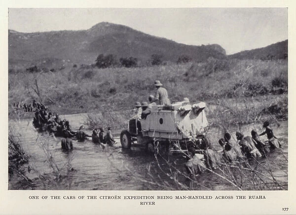 One of the cars of the Citroen expedition being man-handled across the Ruaha river (b  /  w photo)
