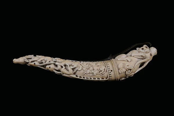 Carved powder horn, North India (ivory with brass stopper)